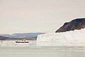 Cruise ship off the Eqip sermia glacier