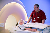 Radiographer preparing an MRI scan