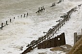 Waves crashing against the sea defences