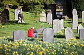 A woman in Troutbeck church graveyard