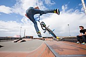 Teenage boys perform aerial stunts