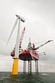 A jack up barge fitting wind turbines