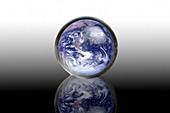 Earth in a crystal ball,conceptual image