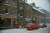 Blizzard scene in English town high street