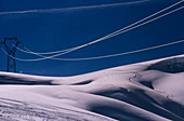 Power lines and pylons in French Alps