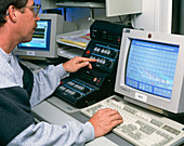 Atmospheric researcher at a laser radar's controls