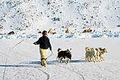 Inuit with dogs