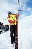 Glaciologist drilling an ice core,Sweden