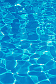 Water ripples on the surface of a pool