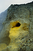 Sulphur deposits flow from volcano blowhloe