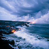 Lava flow running into the sea off Hawaii