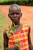 Child with a plant