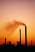 Industrial air pollution at sunset