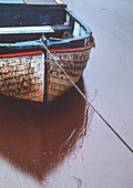 Boat in oil slick