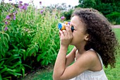 Girl using binoculars