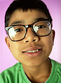 Boy wearing glasses