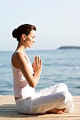 Woman performing yoga exercise