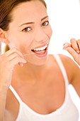 Woman flossing