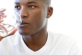 Man drinking a glass of water