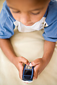 Boy using a mobile phone