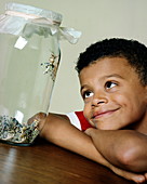 Boy with pet locusts