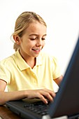 Girl using a laptop computer