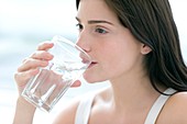 Woman drinking a glass of water