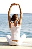 Woman performing yoga exercises