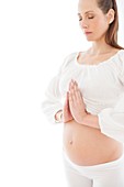 Pregnant woman practicing yoga