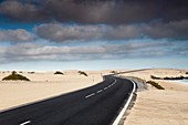 Road through sand dunes,Canary Islands