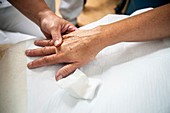 Nurse preparing a patient for an IV line