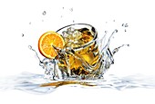 Cocktail splashing into water,artwork