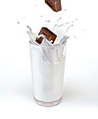 Chocolate falling into milk,artwork