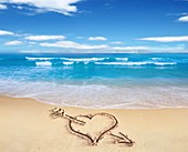 Heart shape on sandy beach,artwork