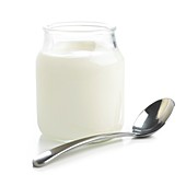 Jar of fresh yoghurt and spoon