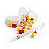 Syringe and capsules
