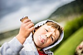 Boy holding ice cream