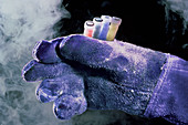 Gloved hand with sample tubes from liquid nitrogen