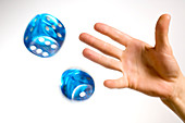 Hand throwing dice
