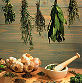 Dried herbs with garlic,pestle & mortar