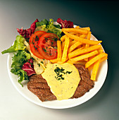 Plate of steak bearnaise,chips and salad