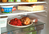 Cooked & raw meat stored on same plate in fridge