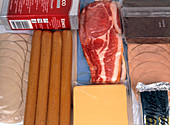 Assortment of vacuum-packaged foods