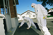 Forensics officers at a crime scene