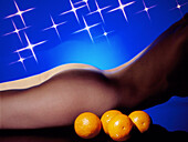 Abstract image of citrus fruit and woman's body