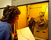 Researcher using an X-ray diffractometer