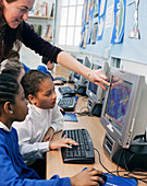 Schoolchildren using computers
