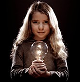 Girl holding a lightbulb