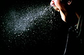 Man sneezing,high-speed photograph