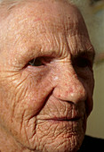 Close-up of the face of an elderly woman